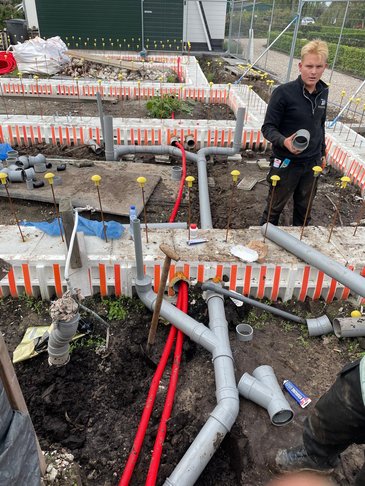 Nieuwe PVC-afvoer vanaf de regenpijp